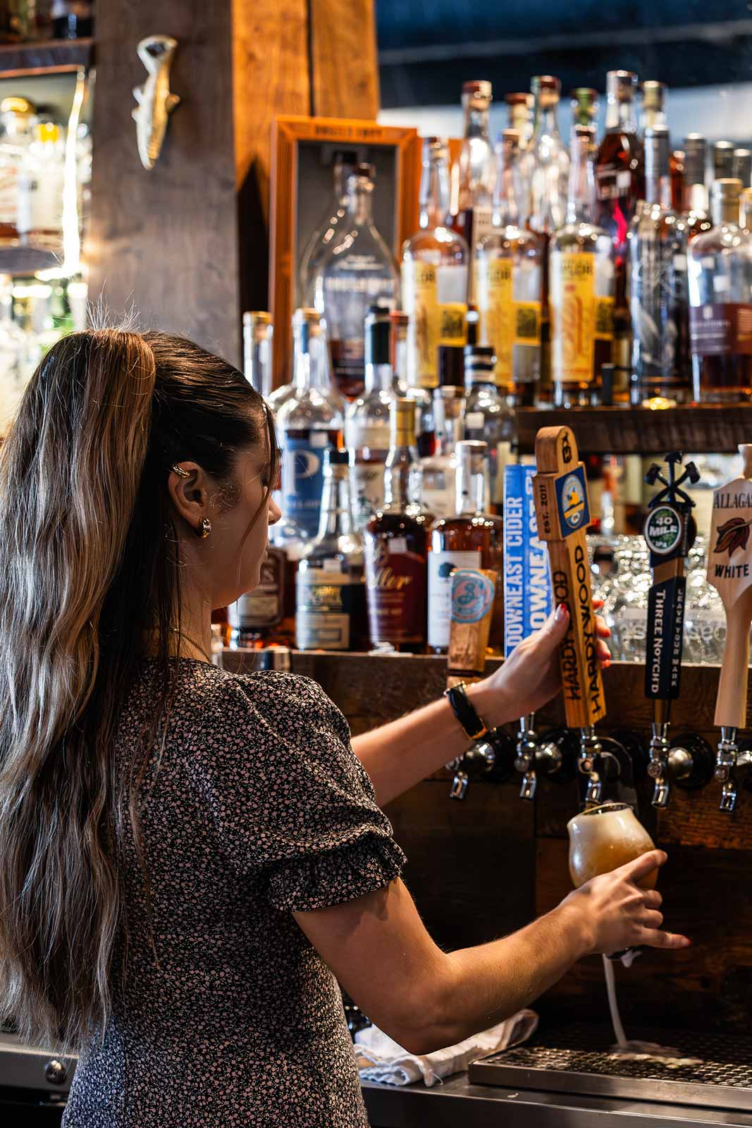 The Village Bartender Pouring Beer